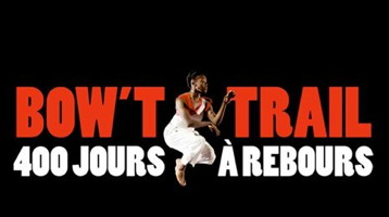 Logo : une femme noire, en robe blanche, saute dans les airs, ses bras dans une position difficile à décrire. 400 jours à rebours