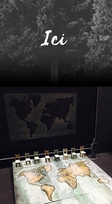 Deux images officielles: 1) photo de sapins géants, la nuit, on discerne un chemin ou pont en bois au milieu qui se perd dans la noirceur. 2) une carte du monde imprimée sur un panneau plat: 8 chaises miniatures sont alignées au haut.