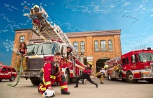 Image thématique pour Les Veillées dans Saint-Sauveur : des pompiers ici et là, incarnés par les artistes, devant une caserne. Deux camions de pompiers agrémentent le tout. Le ciel est dessiné à la main.