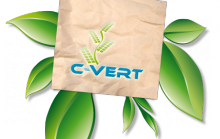 Logo de C-Vert : sur une plante ayant six feuilles vertes, un bout de papier carré avec les lettres C-VERT et un dessin de tige de blé.